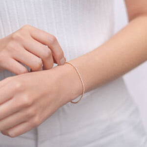 Pulsera-circones-infinitos-enchape-en-oro-rosa-details